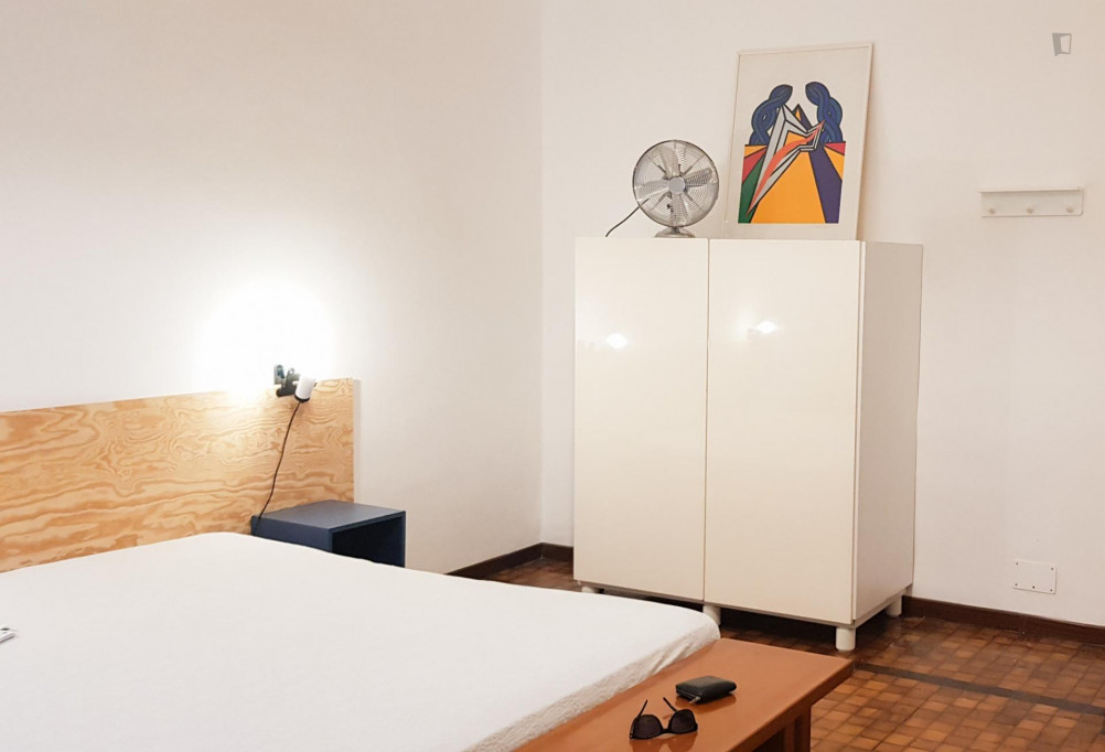 A spacious double bedroom, in a 3-room flat