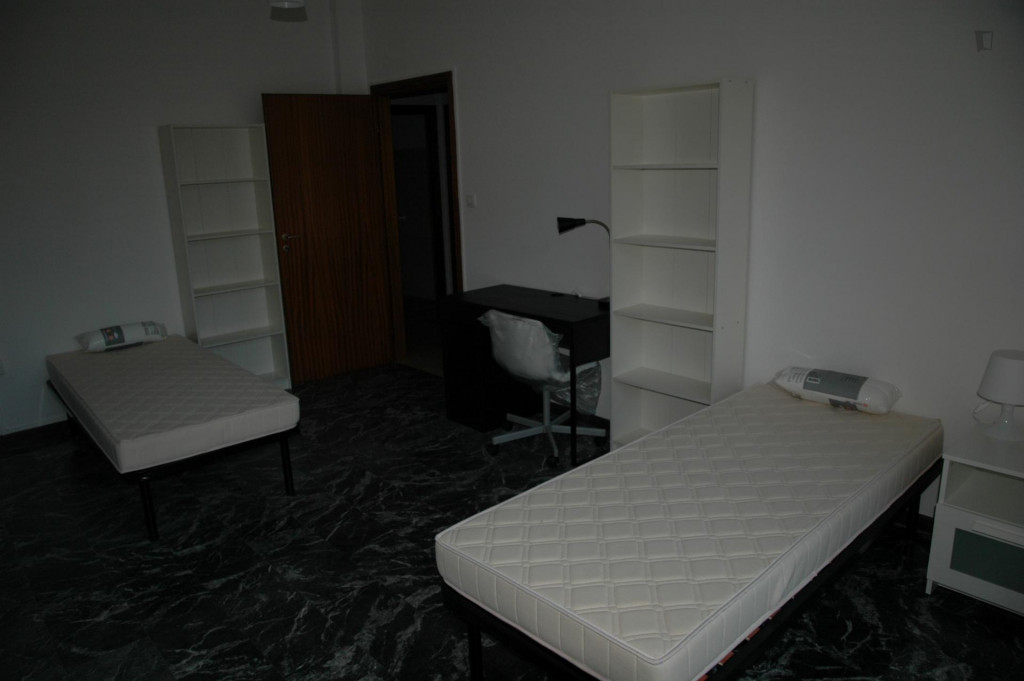 Bed in a twin bedroom in Mazzini neighbourhood